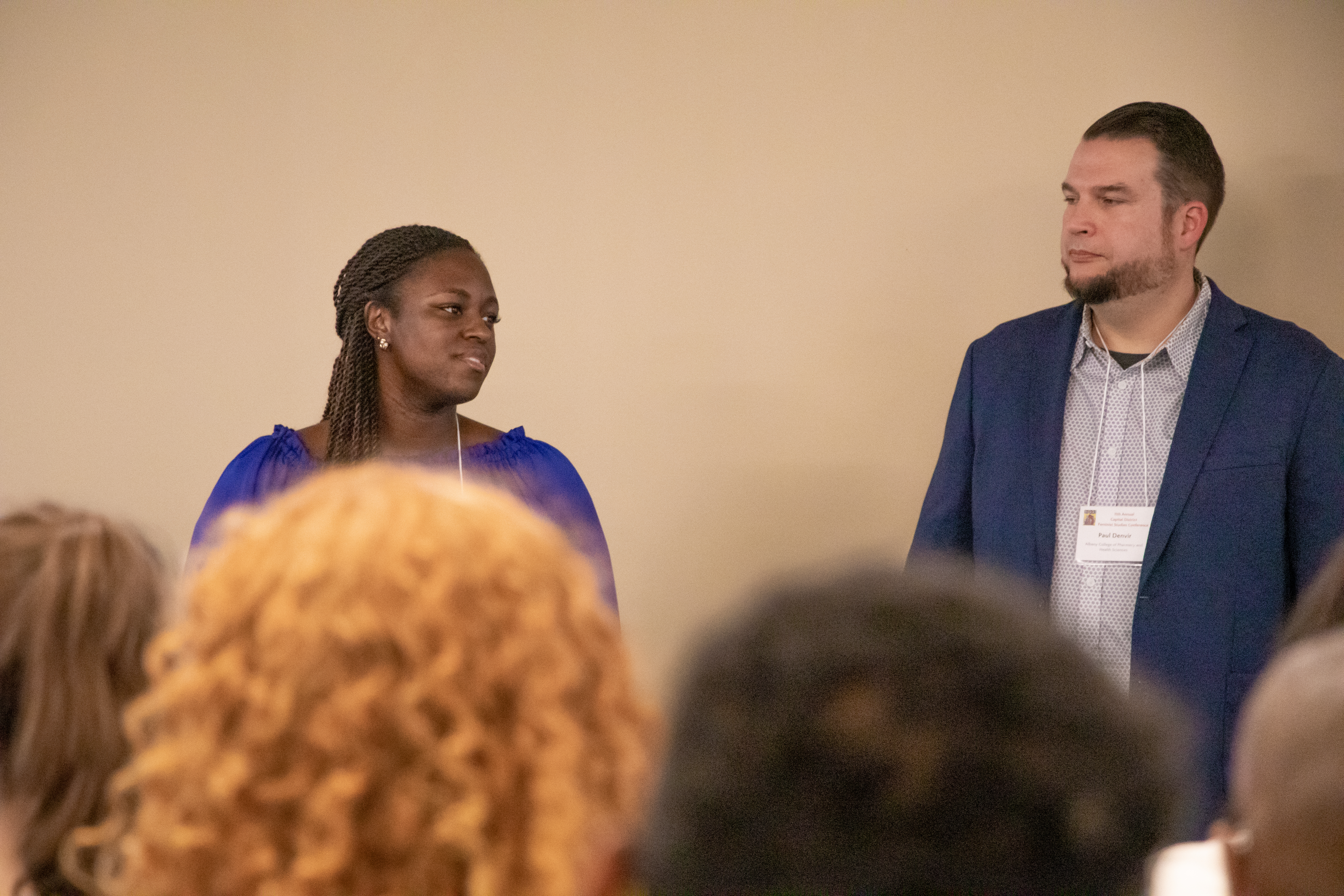 ACPHS Student Britney Mbeng and Associate Professor Paul Denvir present research at Feminist Conference