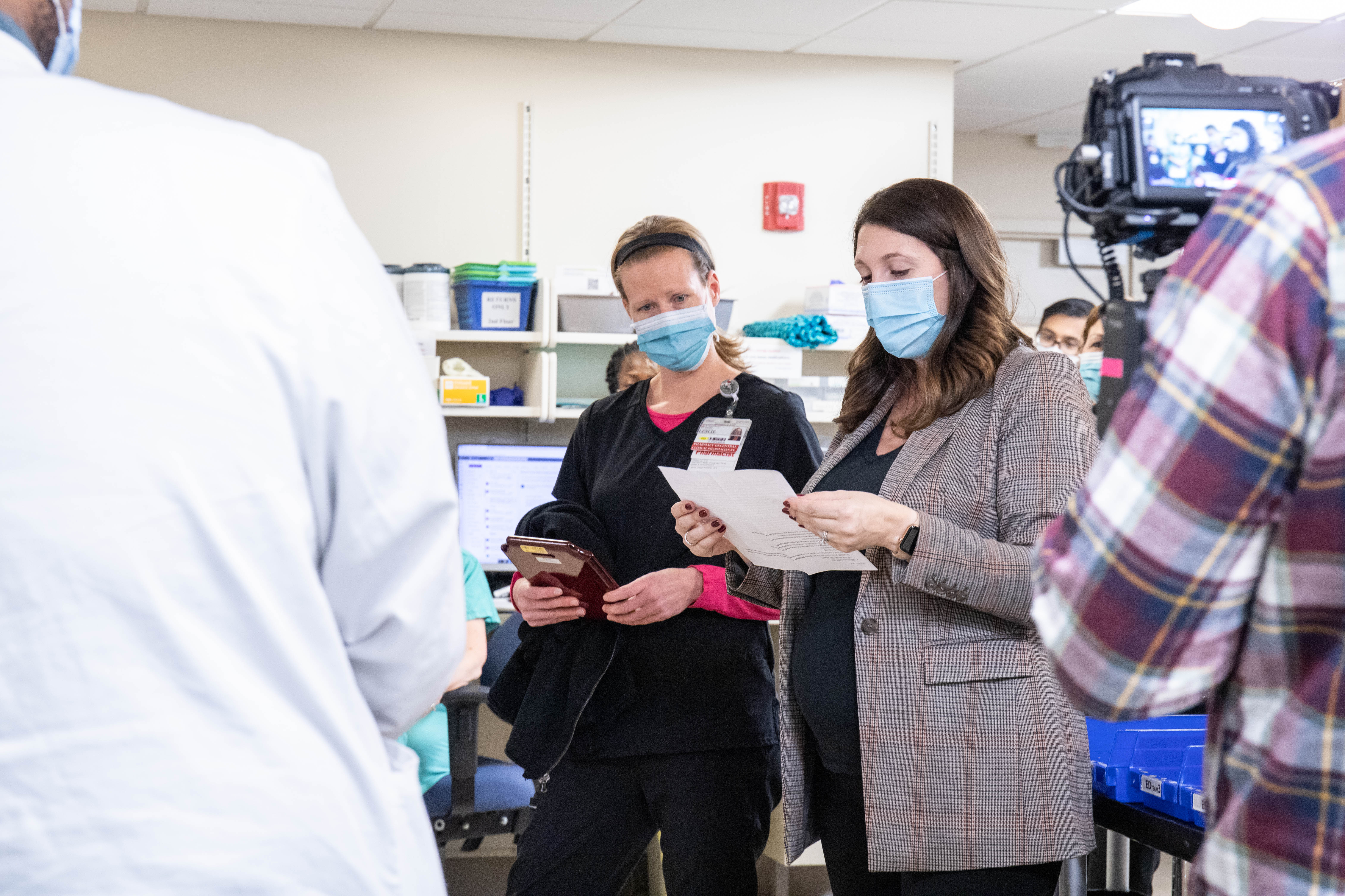 Dr. Leslie Riddle listens as Dr. Courtney Tackes presents her Preceptor of the Year award