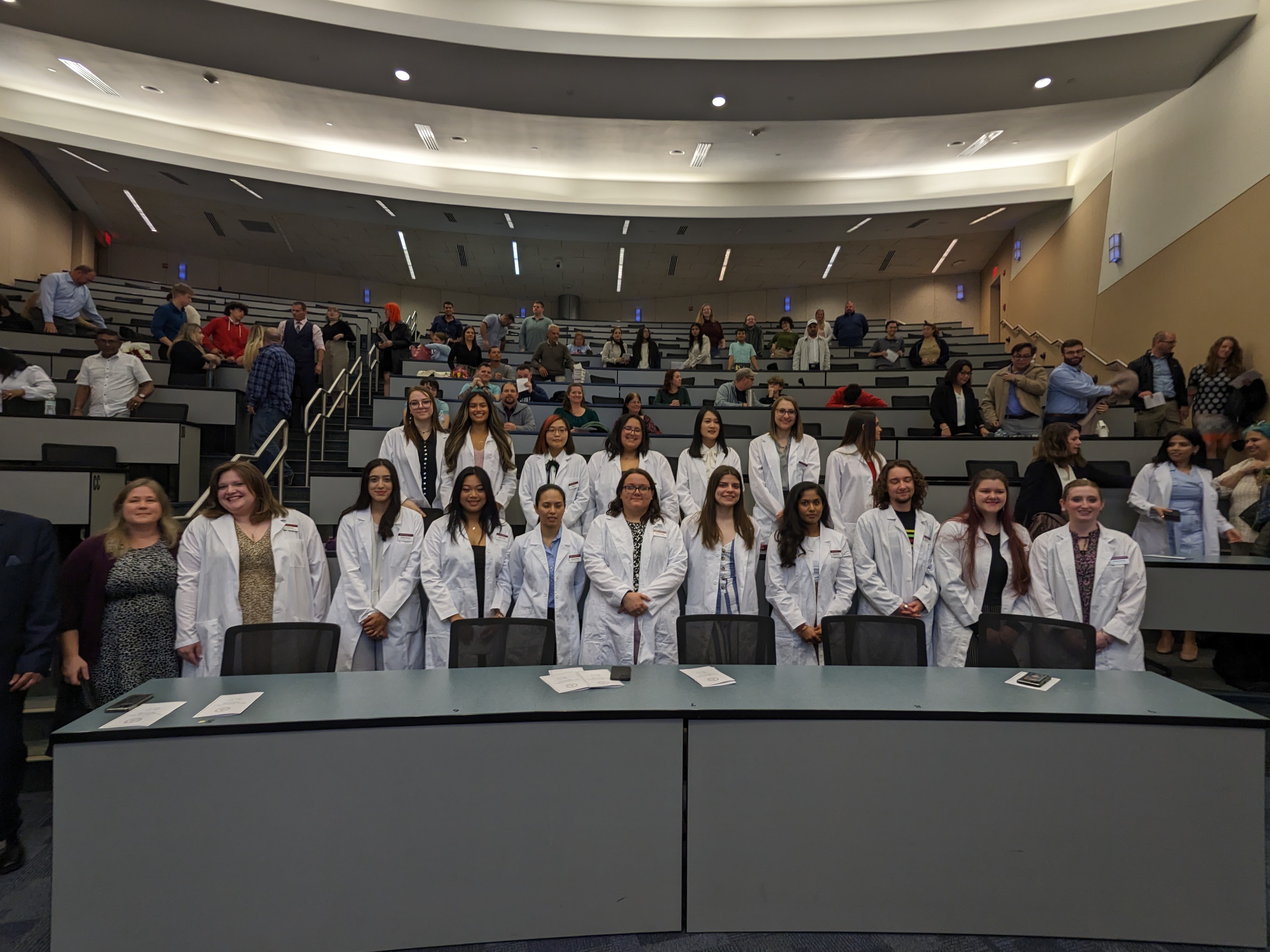 Students who received their white coats at an April 23, 2023 ceremony