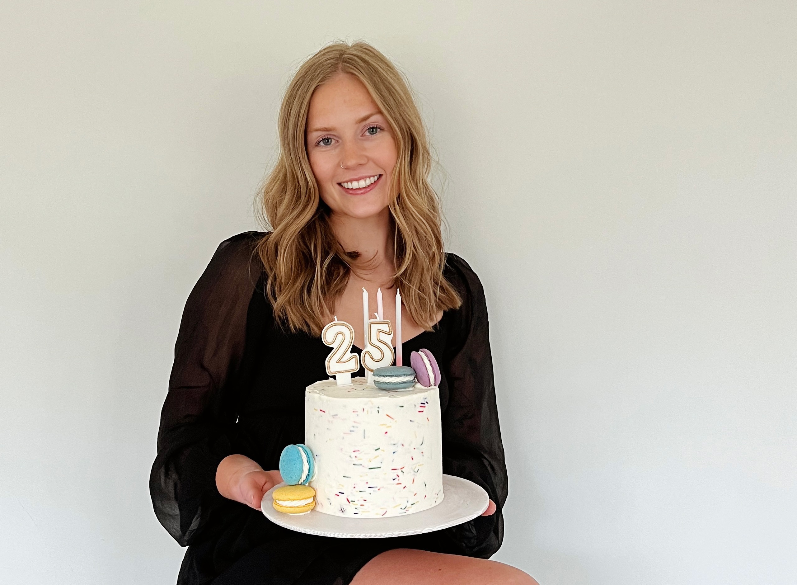 Morgan Gerber holding a birthday cake