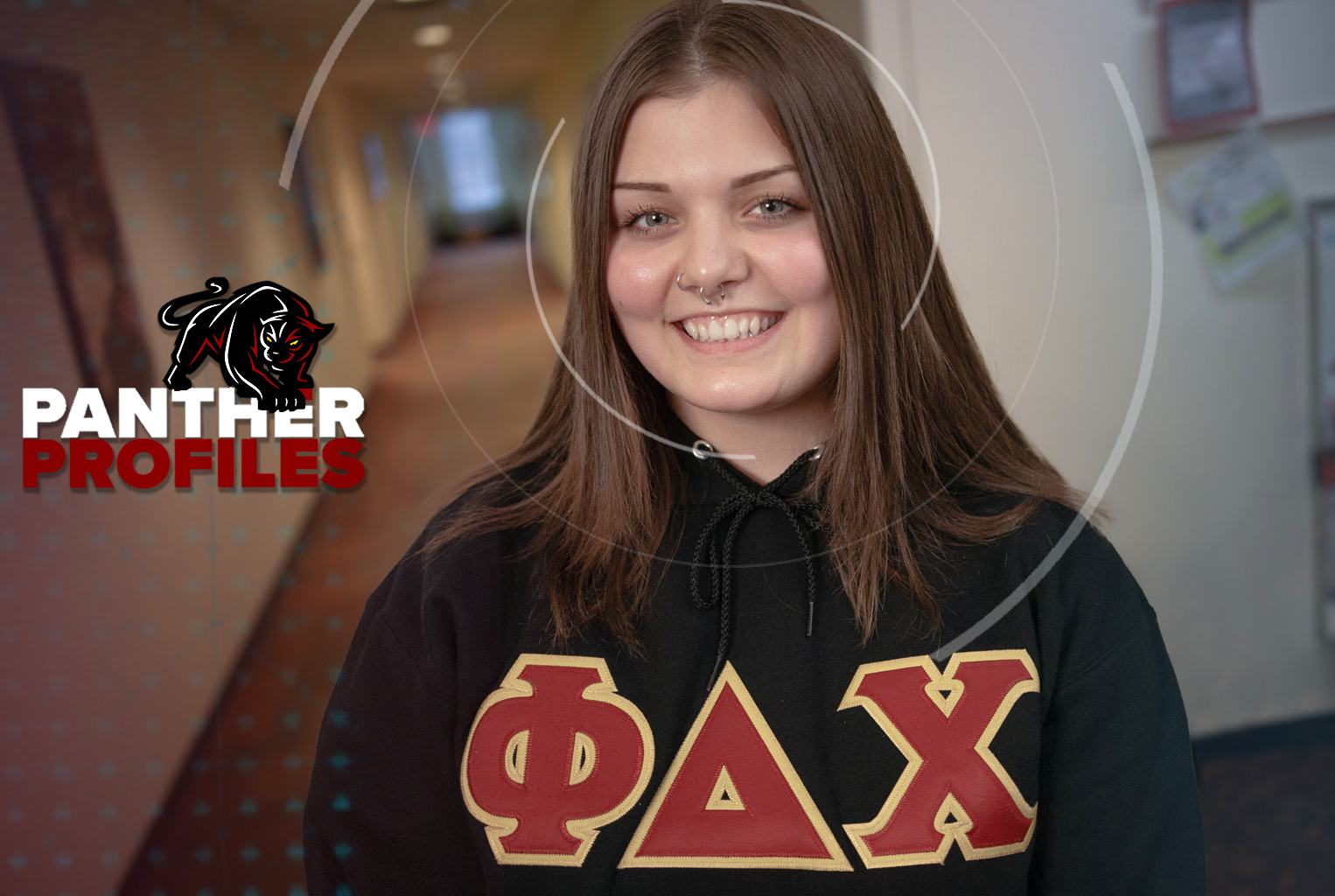 ACPHS Student Samantha Marion in a Phi Delta Chi sweatshirt with Panther Profile logo