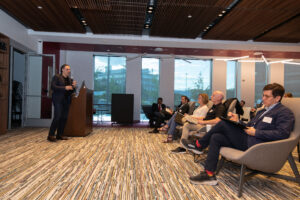 Attendees of the bioinnovation pitch night listen to a presentation