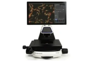 EVOS M5000 microscope displaying live fluorescent cell imaging on screen.