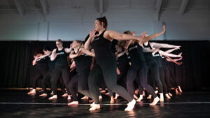 Dance team performs on stage