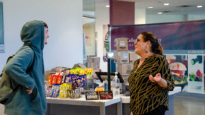 Dining Hall Manager speaks to student in Dining Hall
