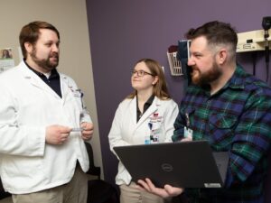 Dr Michael Zappone with Caleb Kinsey and Katrina Scali