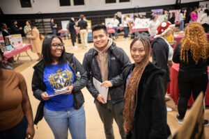 Students smile at involvement fair