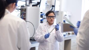 Program Director Payel Datta teaches students in biotechnology classroom