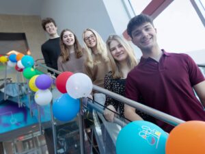Medical Lab Science Club students stand on stairwell