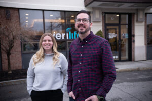 ACPHS student Mikayla Toussaint with Pharmacist Dr. Thomas Larson outside the Verilife medical marijuana dispensary in Albany