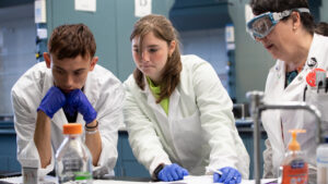 Students and faculty member in pharamaceutical sciences lab