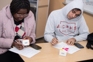 Students take notes during Narcan Training