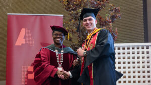 Toyin Tofade, Presidnet of ACPHS hands diploma to Dom