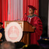 Toyin Tofade addresses the crowd at Inauguration ceremony