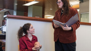 Mock Trial Students having a conversation. L-R: Emily Luke, Bridget Longdon