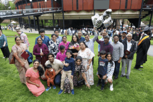 big family posing together at commencement
