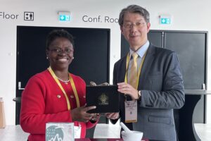 Photo of Toyin Tofade and Chian-Ying Chou, Ph.D., RPh., Director of the Department of Pharmacy at Taipei VGH