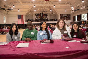 A group of female high school sitting at a table at the 2026 Future of Healthcare event
