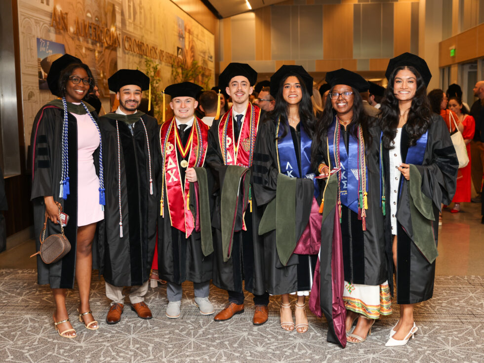 2025 graduates pose for a group photo at the ceremony