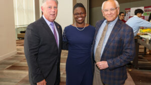 Assembly member John McDonald, ACPHS President Toyin Tofade and Congress member Paul Tonko pose at event.