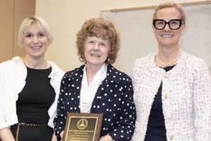 A photo of Katie Cardone, Laurie Briceland and Dean Umland at the Employee Recognition Event
