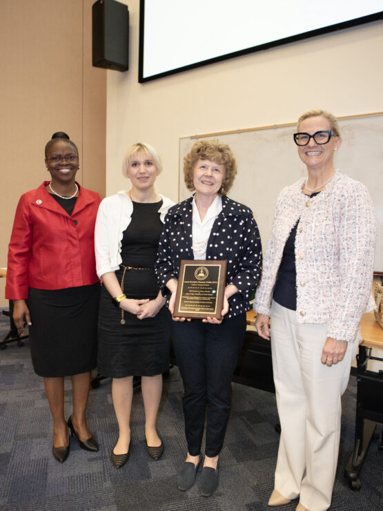 President Tofade, Katie Cardone, Laurie Briceland and Elena Umland to celebrate Laurie's retirement