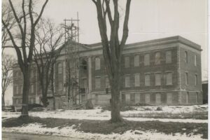 black and white photo of ACP's O'Brien Building in 1926 as the city planned to make it a three story building 