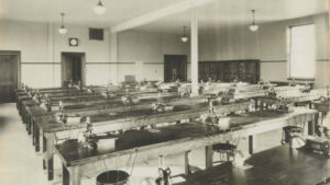 A black and white photo of the pharmacy lab from 1926